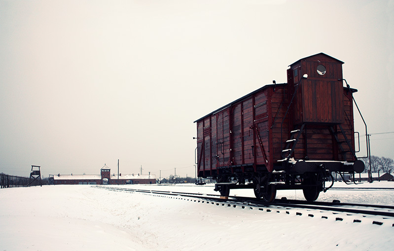 rusted freight car against a snowy background